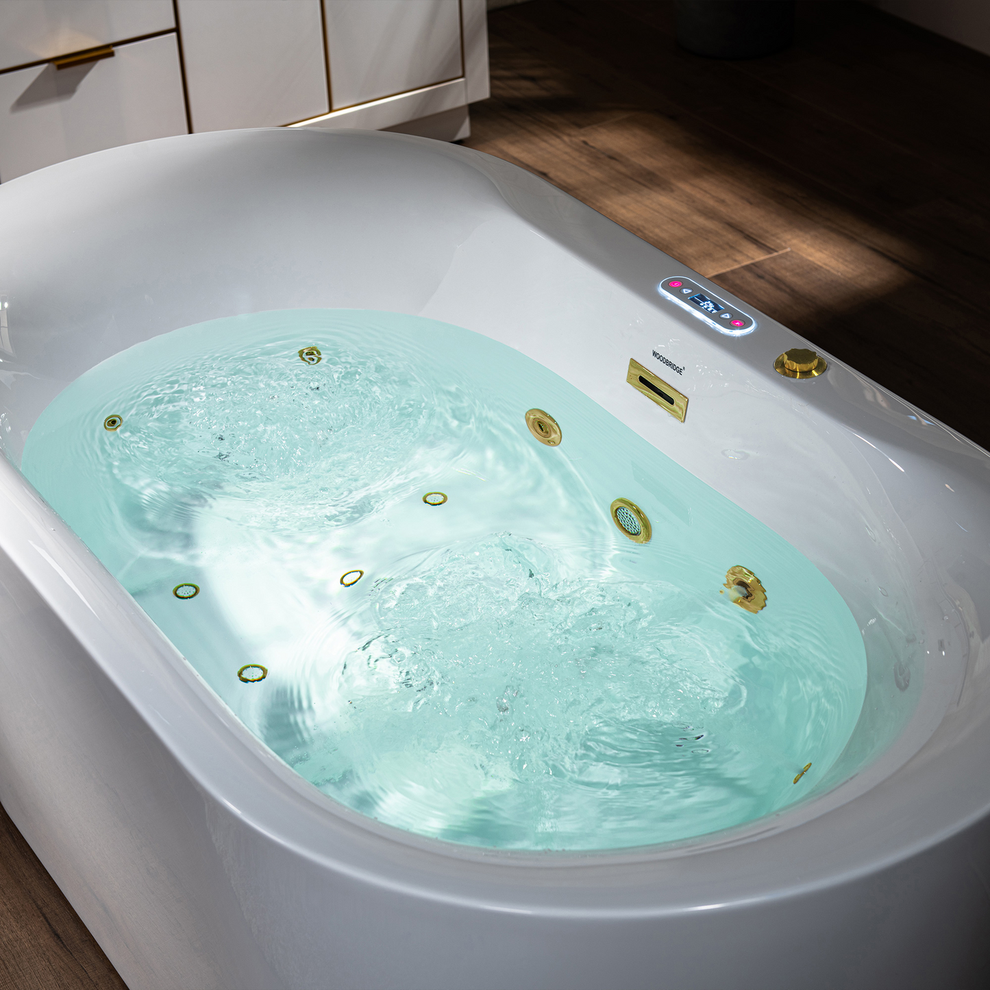 Woodbridge BG100 59" freestanding btub with 6 adjustable whirlpool jets and 10 air jets showing whirlpool jets in action.png