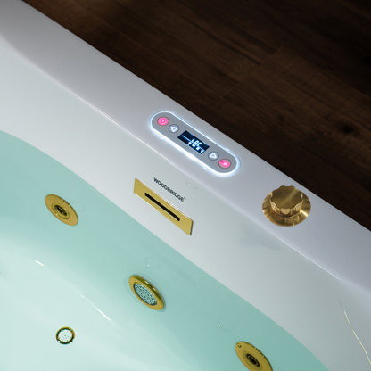 Close-up detail of brushed gold full-draining jets and LED controls on Woodbridge BG100 59" acrylic freestanding bathtub with air and whirlpool massage.png